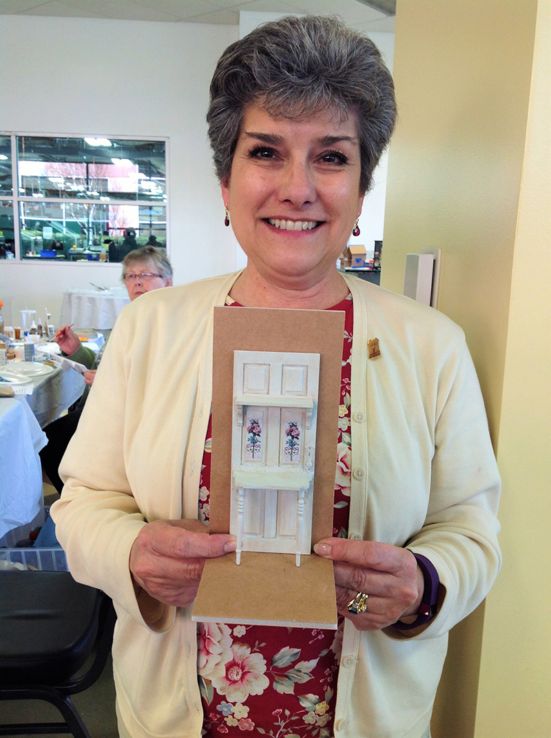 Karen Tomajan showing her shabby chic project.