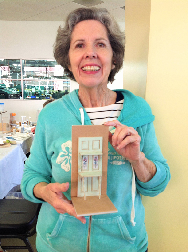 Suzanne Harrington-Cole displays her partially finished project.